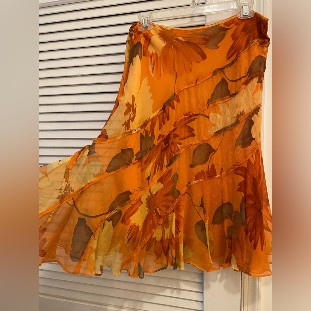 Emanuel Ungaro silk skirt, orange tone floral, size 6. Fully lined. Never wore.